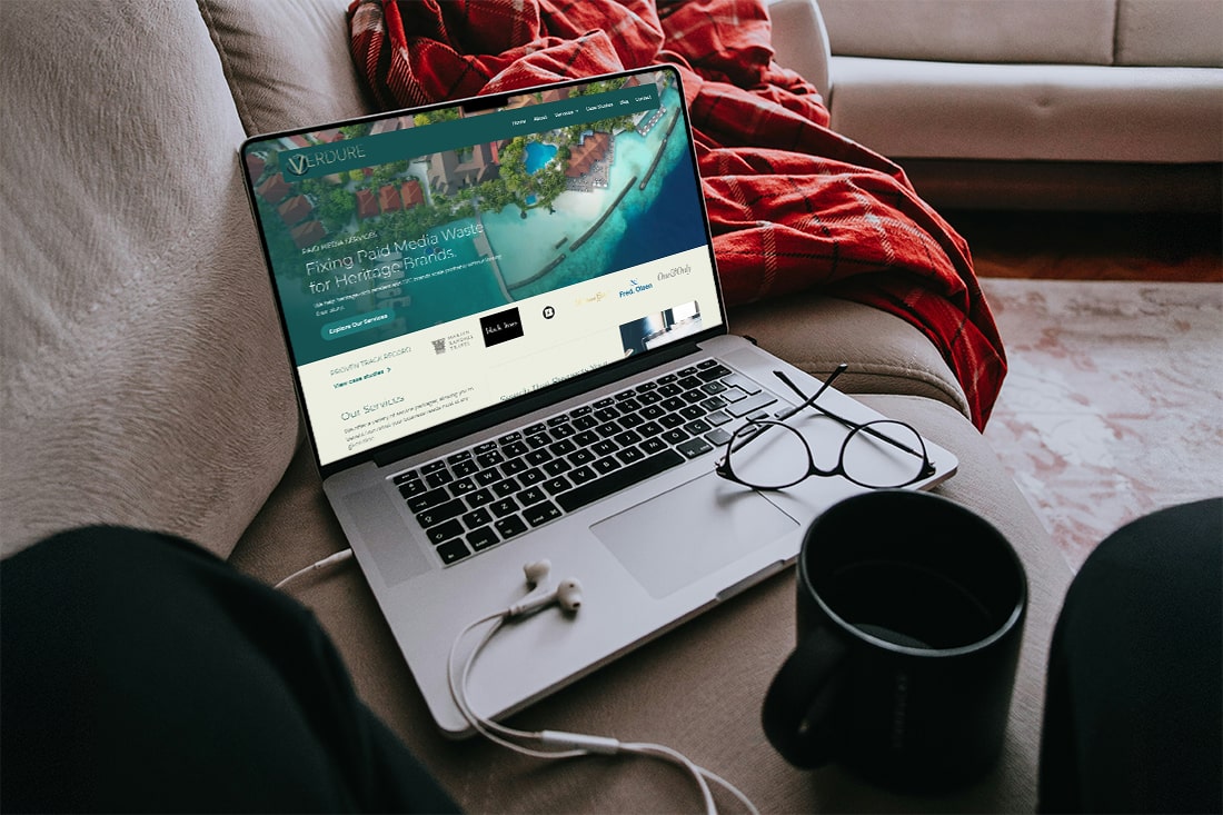 Modern website project displayed on a MacBook Pro