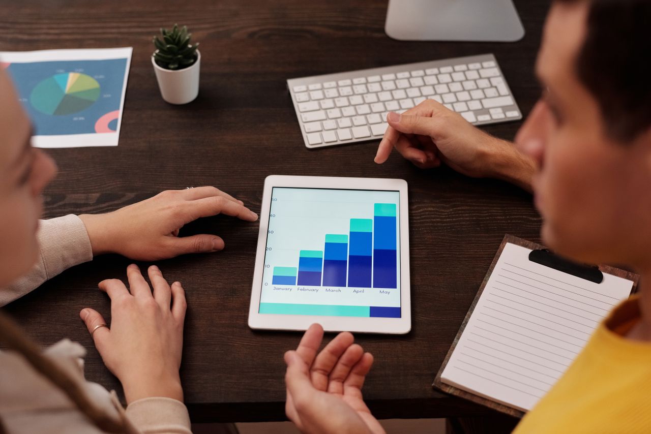 Business team reviewing performance data and charts